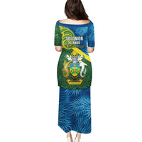 solomon-islands-puletasi-tropical-leaves-with-melanesian-pattern