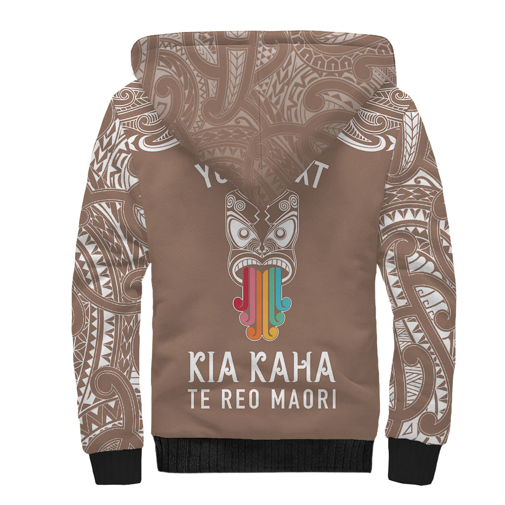 personalised-kia-kaha-te-reo-maori-sherpa-hoodie-hei-tiki-mix-koru-brown