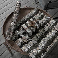 Black and Beige Hawaii Shell Lei Wrapping Paper Hawaiian Sunrise Shell Hebrew Cone Plumeria - Polynesian Pride